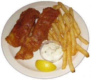 Beer battered fish, french fries and tartar-sauce dinner plate.