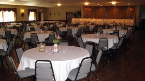 KC Hall seating with wedding reception table setup. Seating capacity 300 guests.