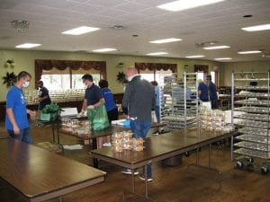 Kiwanis of Fond du Lac Annual Pork Festival preparation inside Avenue 795.