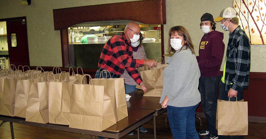 KC 10th Annual Chicken Dinner in carryout style.