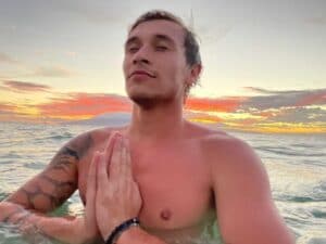 Brook Whitehead comedian meditating in water.