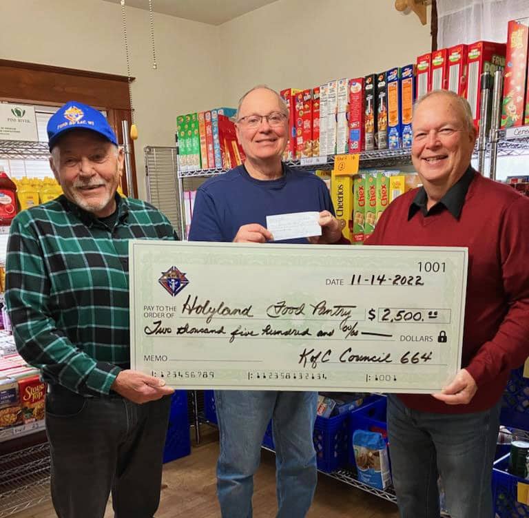 Knights of Columbus, FDL donated $2500 to the HolyLand Food Pantry.